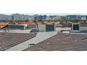 Expansive city skyline view from the rooftop, showcasing a built-in grill at 8144 Monsoon Bay St, Las Vegas, NV 89113
