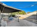 Covered patio with dining area perfect for outdoor entertaining at 1500 Saylor Way, Las Vegas, NV 89108