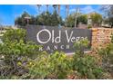 Community sign for Old Vegas Ranch, surrounded by desert landscaping at 2407 Belt Buckley Dr, Henderson, NV 89002