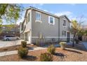 View of the side exterior of a two-story townhouse at 25 Lone Cove Ct # 2, Henderson, NV 89012