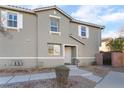 View of front exterior of a two-story townhouse at 25 Lone Cove Ct # 2, Henderson, NV 89012