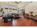 Living room showcasing a comfortable seating arrangement and expansive window views at 26425 Park St, Nelson, NV 89005