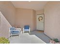 Cozy front porch with seating, perfect for relaxing at 4217 Gliding Gulls Ave, North Las Vegas, NV 89084