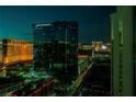 Hilton Grand Vacation suites in the heart of Las Vegas at night offers stunning views of the city lights at 145 E Harmon Ave # 2603, Las Vegas, NV 89109