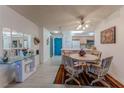 Dining Area with tile floors, decorative mirror and direct access to kitchen at 205 E Harmon Ave # 121, Las Vegas, NV 89169