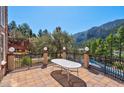 Relaxing outdoor patio with mountain views and wrought iron railings at 264 Crestview Dr, Las Vegas, NV 89124