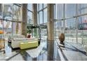Bright lobby area with modern decor, comfortable seating, and sleek black marble floors at 3722 Las Vegas Blvd # 1609, Las Vegas, NV 89158