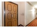 Hallway and front door featuring a door number and leading into the home at 730 S Royal Crest Cir # 424, Las Vegas, NV 89169