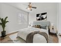 Staged bedroom with ample natural light, a ceiling fan, and contemporary decor at 9050 W Warm Springs Rd # 2153, Las Vegas, NV 89148