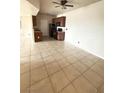 Spacious living area featuring tile floors, ceiling fan, and an open concept kitchen at 3550 Bay Sands Dr # 2087, Laughlin, NV 89029
