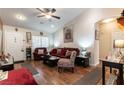 Cozy living room with hardwood floors and natural light at 9293 Boltonia Ct, Las Vegas, NV 89149