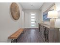 Entryway with modern decor and plenty of natural light from the door at 106 Reflection Bay Dr, Henderson, NV 89011