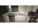 Shows the kitchen with a double basin stainless steel sink and newer appliances at 2981 Country Manor Ln # 2, Las Vegas, NV 89115