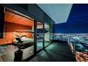 Enjoy breathtaking city views from the balcony connected to the bedroom through sliding glass doors at 4381 W Flamingo Rd # 5708, Las Vegas, NV 89103