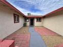 A walkway leading to the front door in a courtyard setting at 6216 Bullion Blvd, Las Vegas, NV 89103