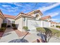 Charming single-story home with a tile roof and two-car garage in a well-maintained community at 7812 Settlers Ridge Ln, Las Vegas, NV 89145