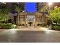 Spectacular building entrance featuring modern architectural design and inviting landscaping at 8255 Las Vegas Blvd # 313, Las Vegas, NV 89123