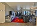 Bright, open-concept living area with stylish furnishings and plenty of natural light at 8255 Las Vegas Blvd # 313, Las Vegas, NV 89123