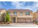 Charming two-story home with a terracotta roof and a spacious three-car garage at 9876 Parador Cellars Ct, Las Vegas, NV 89141