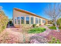Back of beautiful home with manicured landscaping at 2357 Wisconsin Dells Dr, Henderson, NV 89044