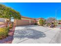 Beautiful home with a three-car garage and a spacious driveway at 2357 Wisconsin Dells Dr, Henderson, NV 89044