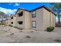 View of the apartment building and the desert landscaping at 2451 N Rainbow Blvd # 1150, Las Vegas, NV 89108