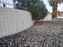 Stone landscaping and partial wall add curb appeal at 3647 Ottawa Cir, Las Vegas, NV 89169