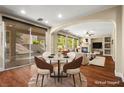 Bright staged dining area with sliding door, leading to a cozy living space at 505 Los Dolces St, Las Vegas, NV 89138