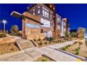 Cordillera community entrance featuring stone accents, modern design, and desert landscaping at 639 Grey Saker St, Las Vegas, NV 89138