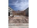 New home under construction with a sturdy wood frame, showcasing the initial phase of building your dream home at 6616 Bowery St, Las Vegas, NV 89148