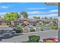 Well-maintained condo complex featuring ample parking, mature trees and beautiful landscaping at 668 Oakmont Ave # 1724, Las Vegas, NV 89109