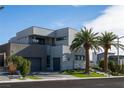 Modern home with desert landscaping, three car garage at 826 Willits St, Las Vegas, NV 89138