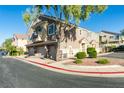 Charming two-story townhome with well-kept landscaping and a three-car garage at 1092 Slate Crossing Ln # 1, Henderson, NV 89002