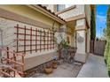 Cozy home front porch with trellis and outdoor plants at 1209 Padre Serra Ln, Las Vegas, NV 89134