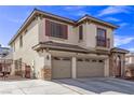 Two-story home boasting a spacious three-car garage and beautiful architectural details at 3009 Little Crimson Ave, North Las Vegas, NV 89081