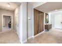 Home's bright foyer features neutral walls, decorative wood accent, and easy access to the rest of the house at 7812 Alola Springs Ln # Lot 1, North Las Vegas, NV 89084