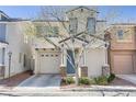 Inviting two-story home showcasing a one car garage, covered entryway, and manicured front yard at 8235 Misty Sage St, Las Vegas, NV 89139