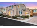 Attractive two-story home with a two-car garage, manicured landscaping, and brick driveway at 9151 Mount Wilson St, Las Vegas, NV 89113