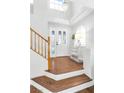 Bright entryway with wood floors and a chandelier, showcasing a welcoming foyer at 11004 Dornoch Castle St, Las Vegas, NV 89141