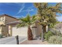 Charming home with a palm tree, nice lawn, tile roof, and two-car garage at 4068 Pistachio Nut Ave, Las Vegas, NV 89115