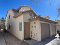 Two-story townhome with private entrance and convenient two-car garage at 6104 Hillside Bloom Ct # 201, Las Vegas, NV 89130