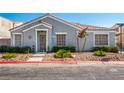 Well maintained single-story home with desert landscaping, and covered front entry at 2510 Influential Ct, North Las Vegas, NV 89031