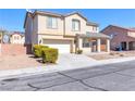 Charming two-story home with desert landscaping and an attached two-car garage at 5616 Dunshee Vista Ave, Las Vegas, NV 89131