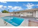 Backyard pool with a patio area and secure fencing for privacy and relaxation at 3800 San Joaquin Ave, Las Vegas, NV 89102