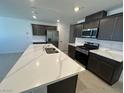 Spacious kitchen featuring a large island, stainless steel appliances, and modern cabinetry at 4238 Lemay St # 2, Las Vegas, NV 89115