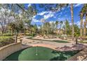 Charming mini golf course with winding paths, perfect for leisure and recreation in a beautiful setting at 9809 Gerald Ct, Las Vegas, NV 89134