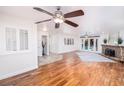 Bright living room boasts wood floors, a fireplace, recessed lighting, and neutral walls at 1561 Doran Dr, Las Vegas, NV 89123