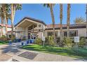 Exterior of the well-maintained clubhouse with inviting landscaping at 3574 Desert Cliff St # 204, Las Vegas, NV 89129