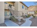 Building exterior featuring stairs leading to the upper units at 3574 Desert Cliff St # 204, Las Vegas, NV 89129