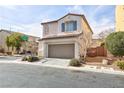 Charming two-story home with a two-car garage and well-maintained landscaping at 9881 Juno Hills St, Las Vegas, NV 89178